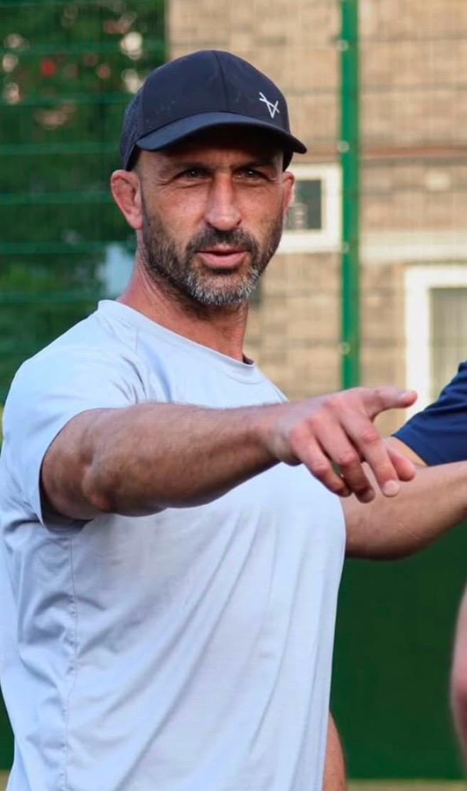 Ben directing players during a coaching session